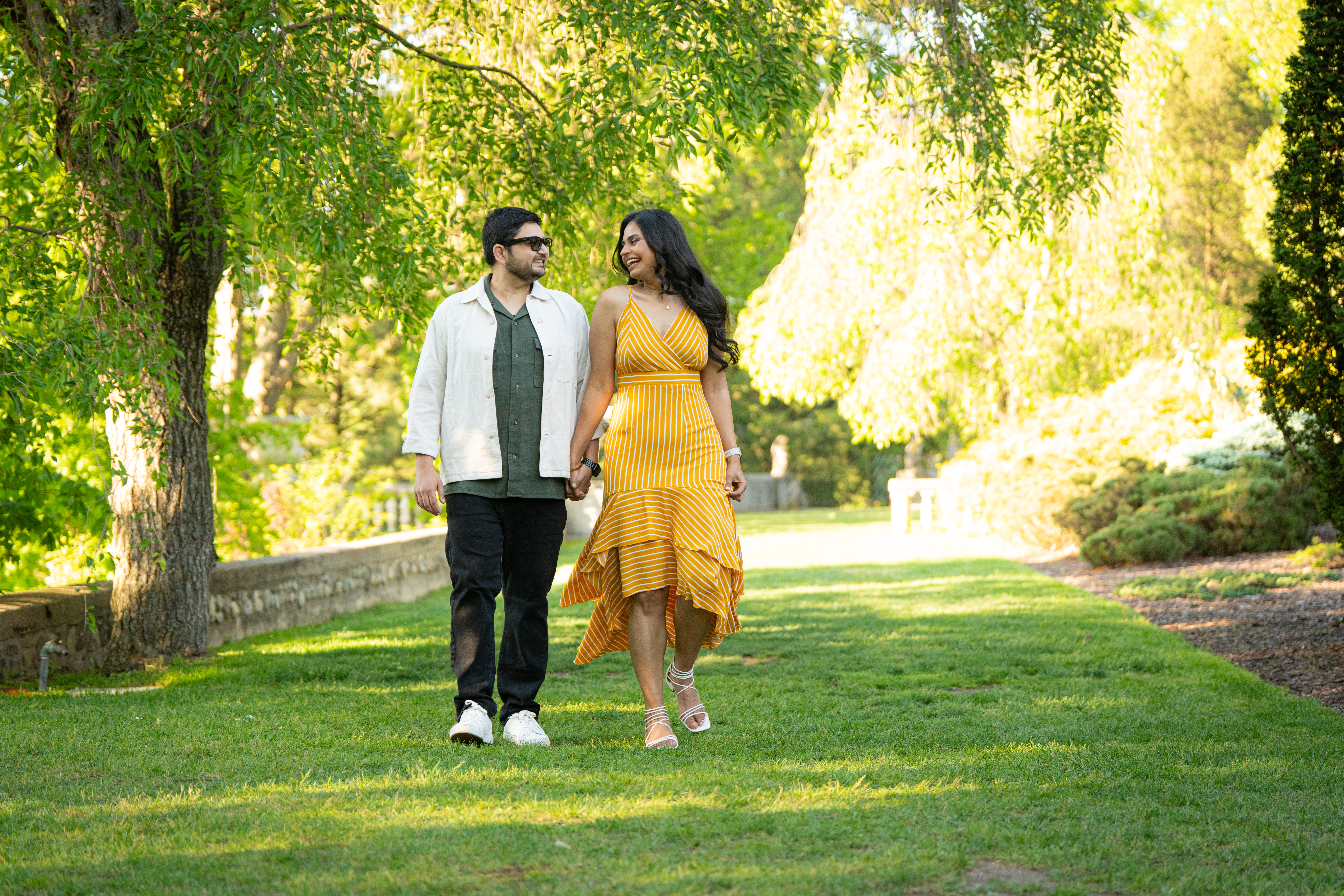 Avisha and Arpan walking outdoors